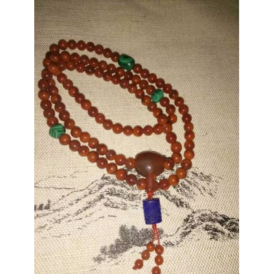 九口满色满肉火焰纹0.75南红配孔雀石顶珠.腰珠